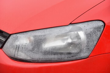 how to remove moisture from headlight